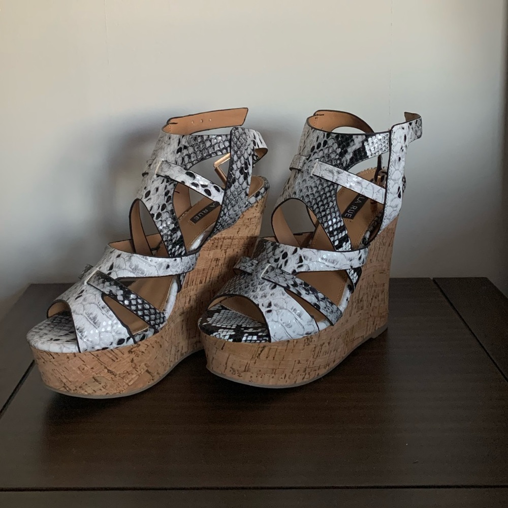 Never worn snakeskin wedges